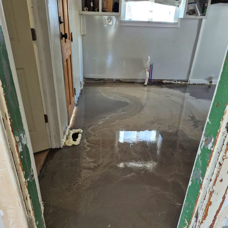 Self-leveling underlayment poured over a subfloor before installation